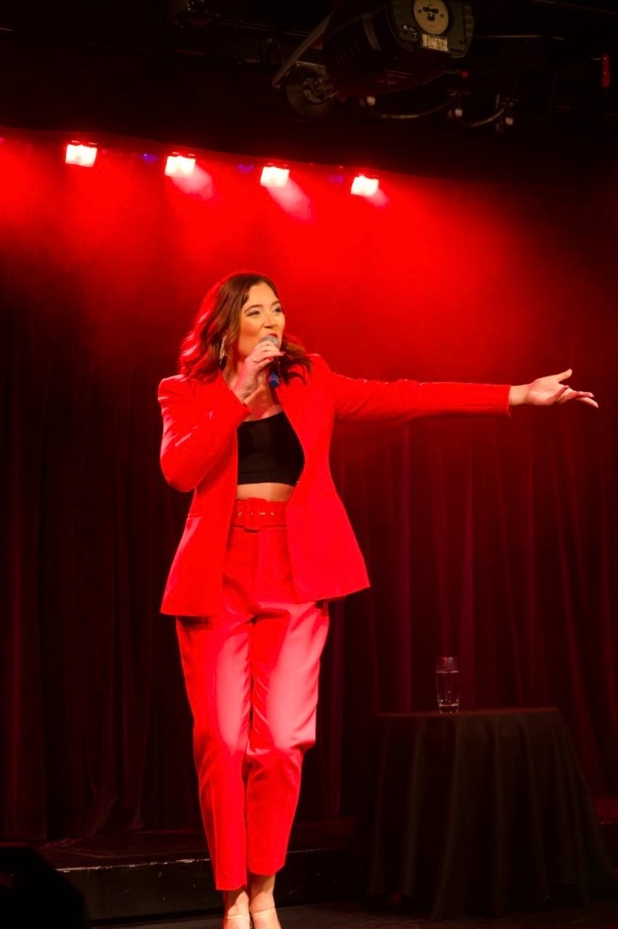 Lana Domeney - Party bands Sydney live performance in red suit