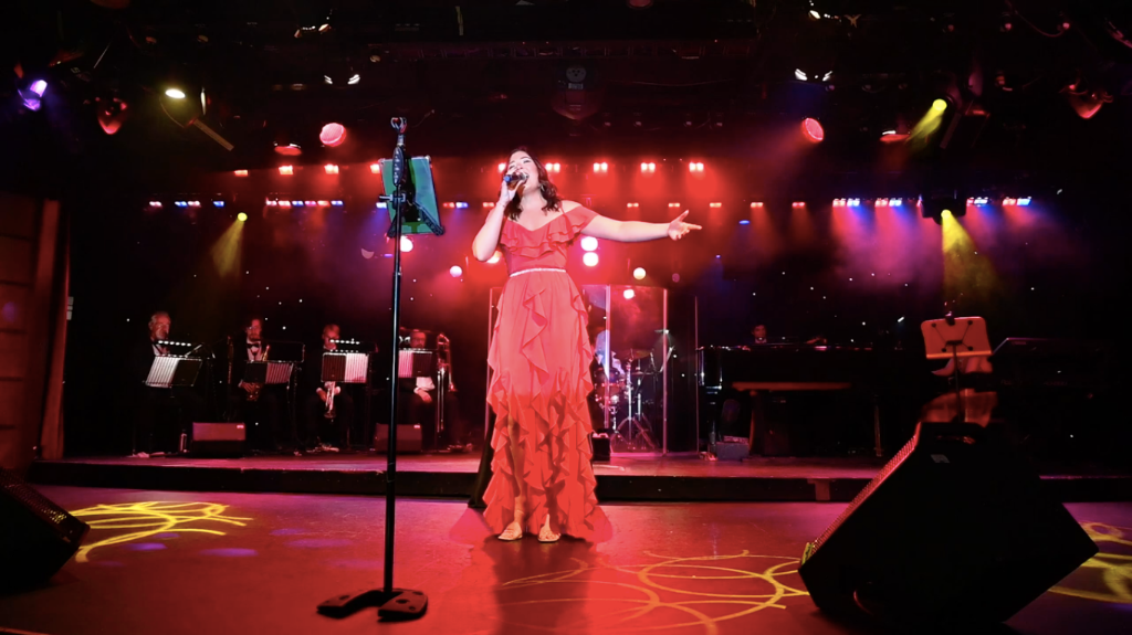 Lana Domeney - Sydney singer performing live on stage with party band